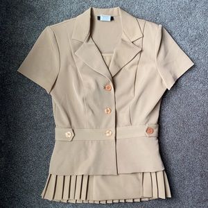 Tan 2 piece suit (long sleeve jacket & skirt).